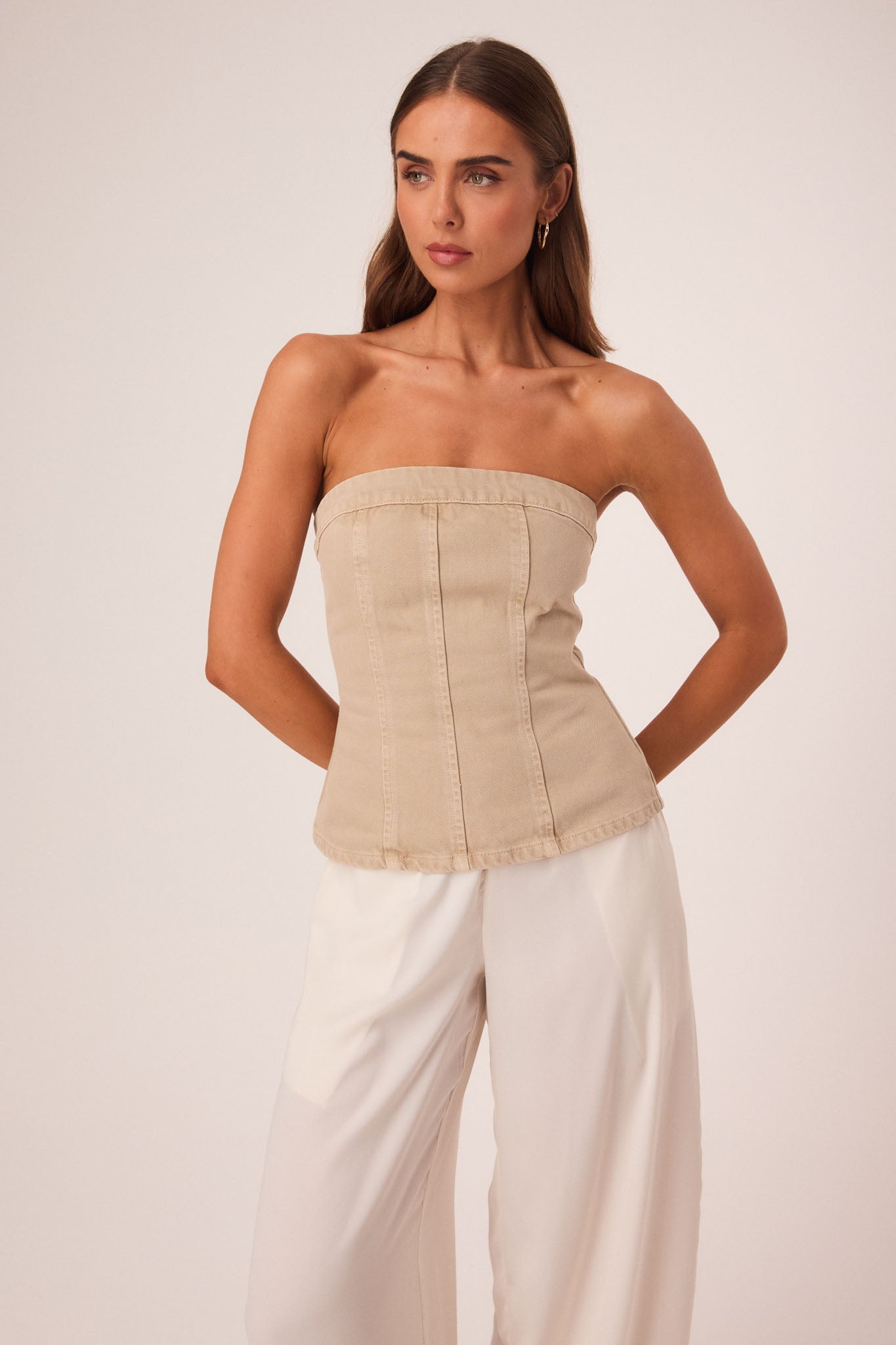 Image of a model wearing Tops. Productname: SNDYS LEX CORSET TOP in Taupe colour by brand - SNDYS