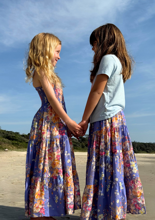 Image of a model wearing Skirts. Productname: LITTLE AUGUSTE Little Miss Maxi Skirt in Purple colour by brand - LITTLE AUGUSTE