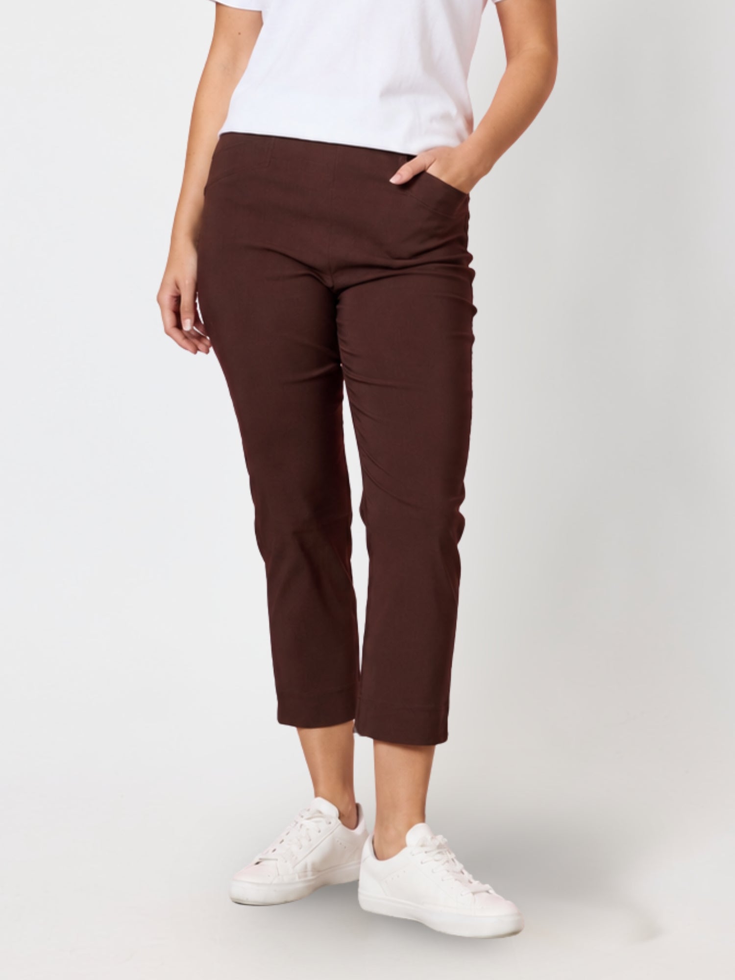 Image of a model wearing Pants. Product name - Zara Stretch Pant Coffee in Coffee colour by brand - Threadz