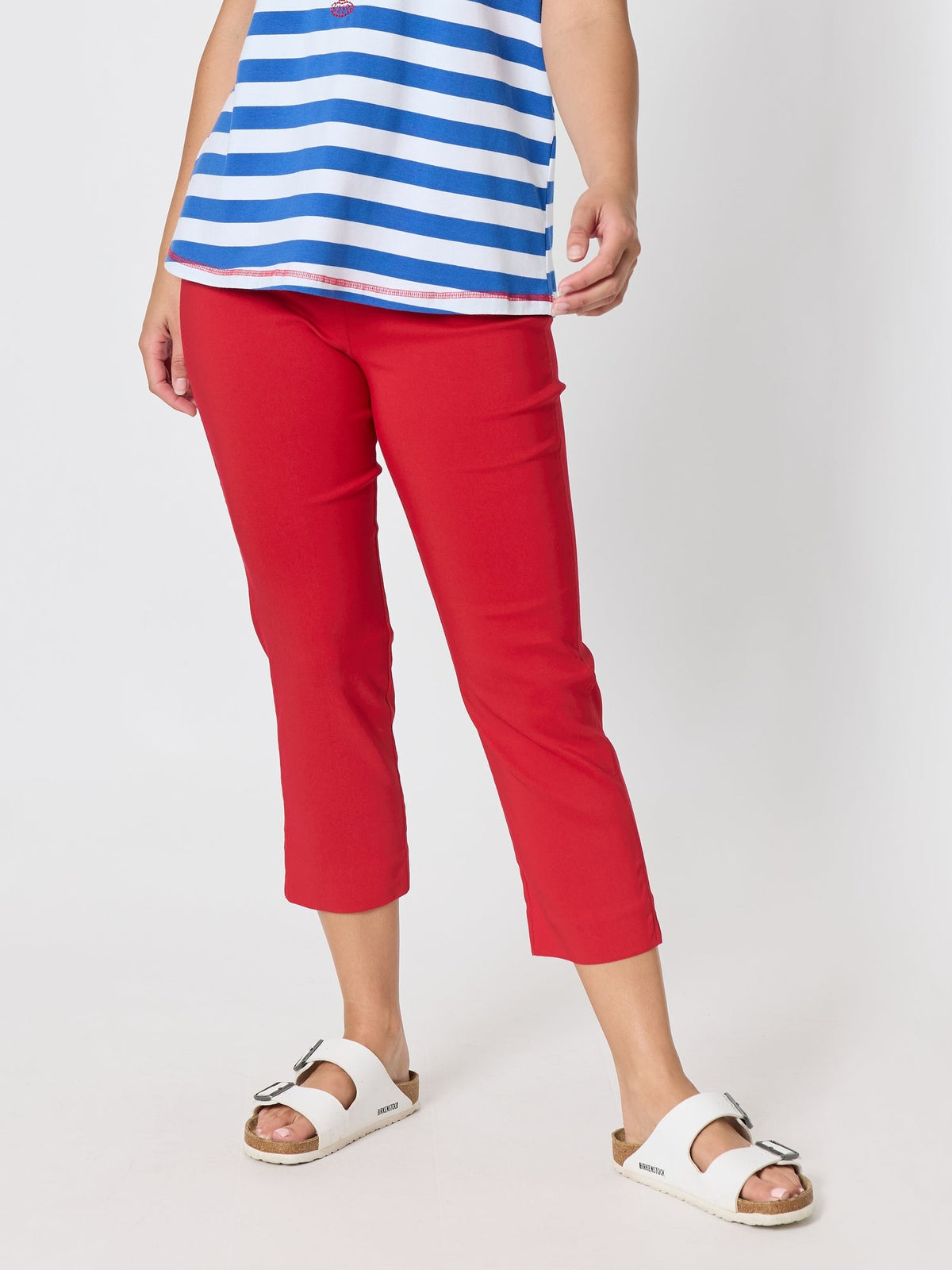 Image of a model wearing Pants. Product name - Zara Stretch Pant Red in Red colour by brand - Threadz