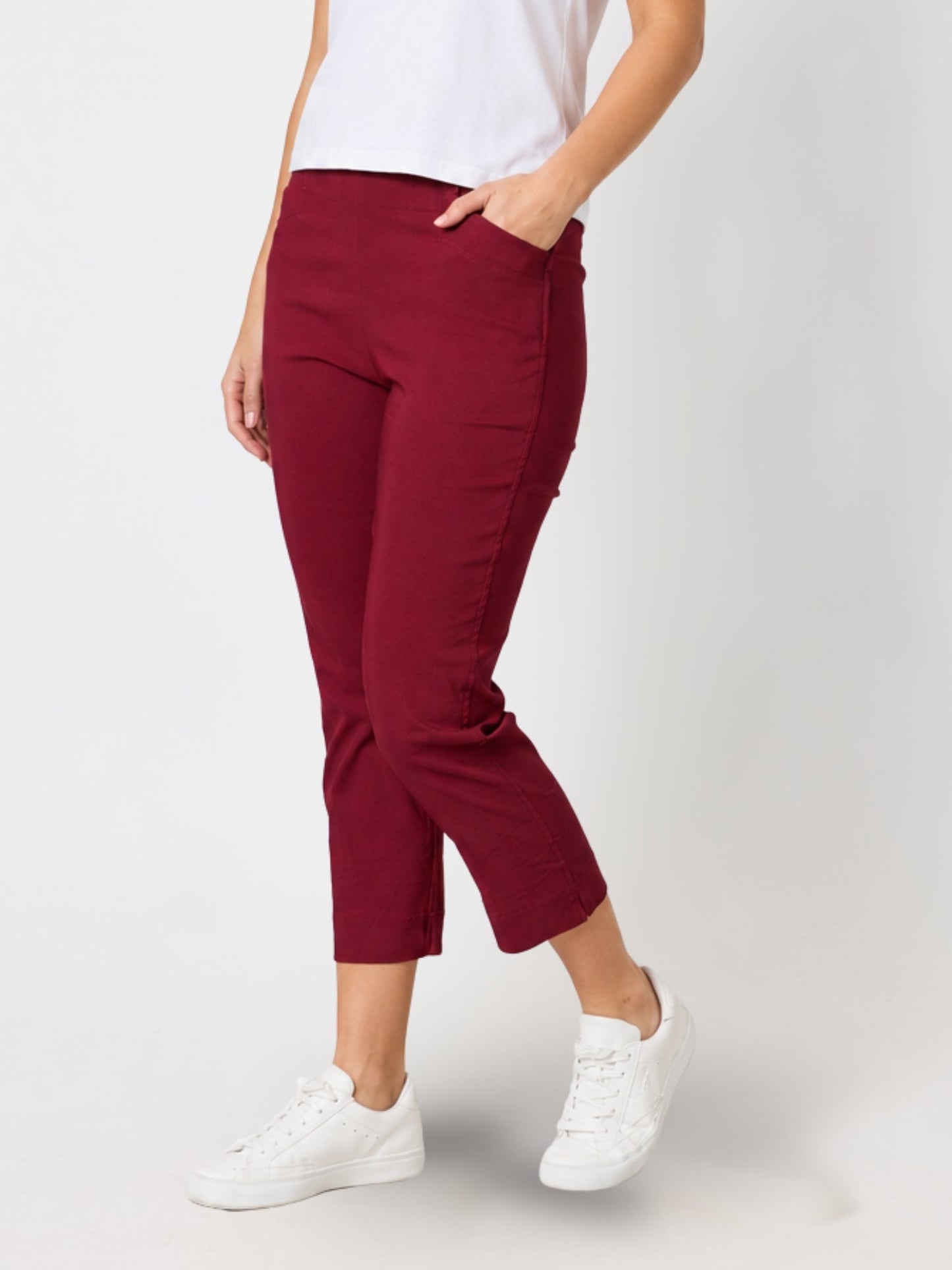 Image of a model wearing Pants. Product name - Zara Stretch Pant Shiraz in Shiraz colour by brand - Threadz