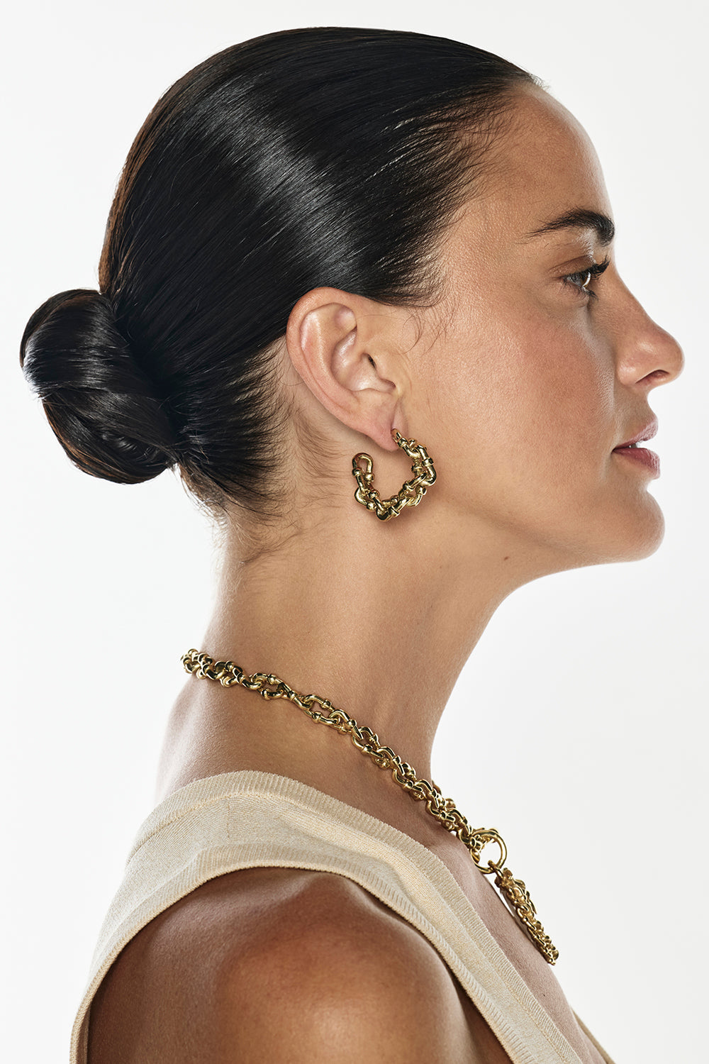 Image of Earrings. Productname: Chunky Chain Hoop Earrings in Gold colour by brand - Manning Cartell