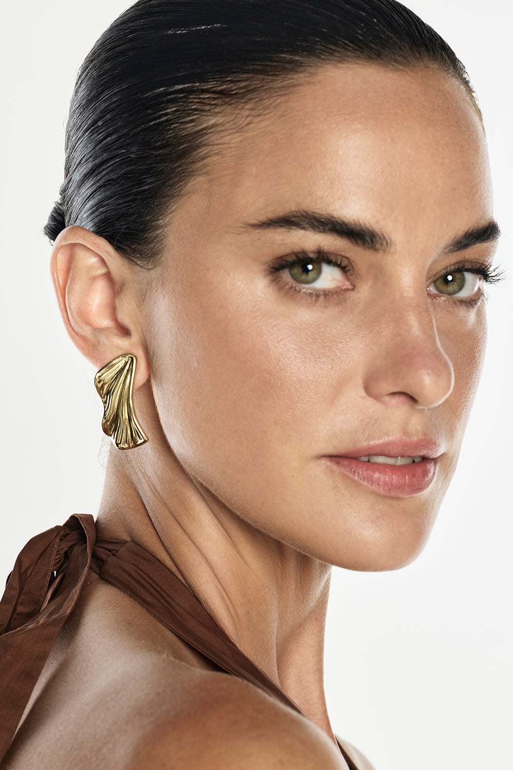 Image of Earrings. Productname: Small Wing Earrings in Gold colour by brand - Manning Cartell