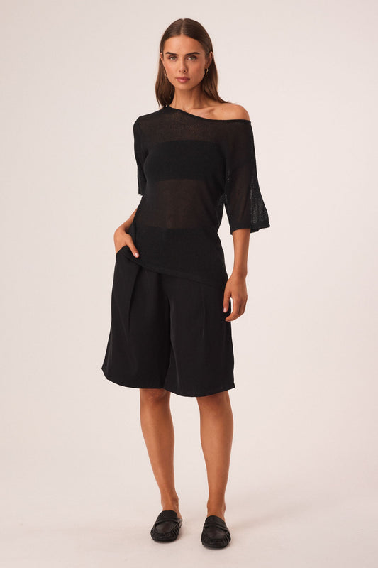 Image of a model wearing Tops. Productname: SNDYS WESTLY TOP in Black colour by brand - SNDYS