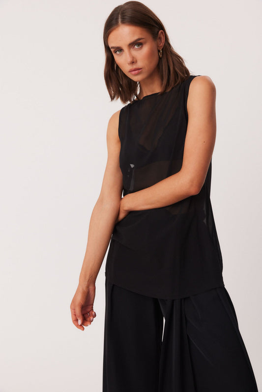 Image of a model wearing Tops. Productname: SNDYS NASH TOP in Black colour by brand - SNDYS