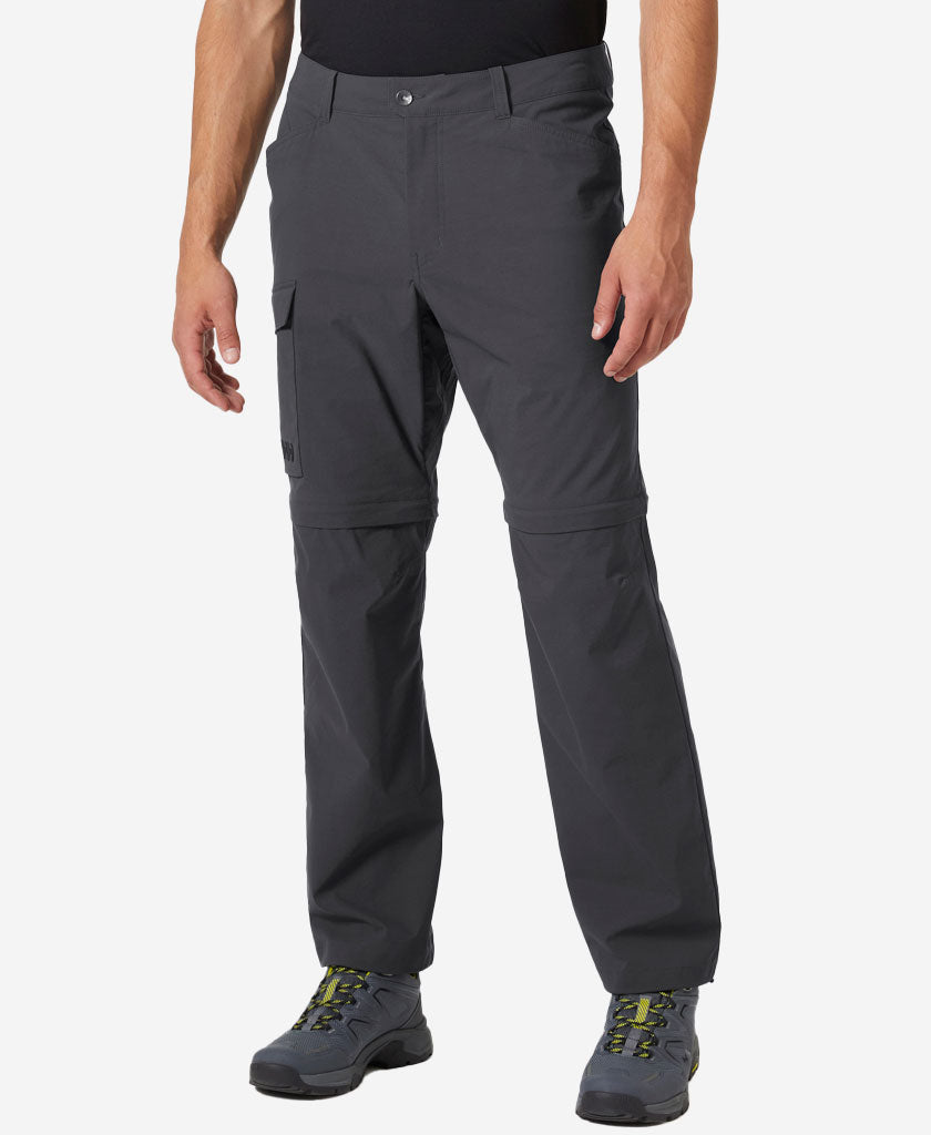 Image of a model wearing Pants. Product name - ELV LIGHT ZIP OFF PANT, Ebony in Ebony colour by brand - Helly Hansen