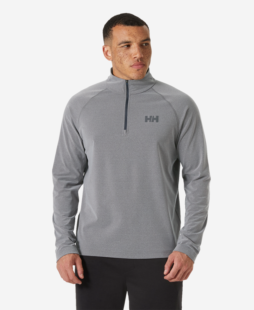 Image of a model wearing Outerwear. Product name - TYRI KNIT 1/2 ZIP, Ebony Melange in Ebony Melange colour by brand - Helly Hansen