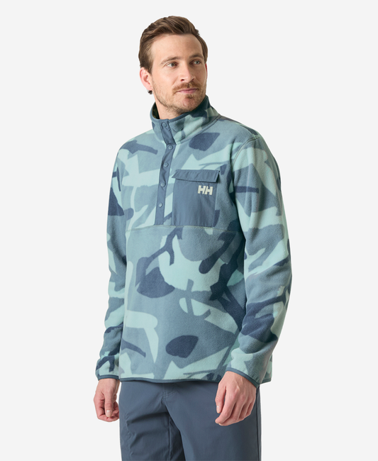 Image of a model wearing Outerwear. Product name - MARIDALEN PRINTED FLEECE, Windy Blue HH JPN Camo in Windy Blue Hh Jpn Camo Aop colour by brand - Helly Hansen