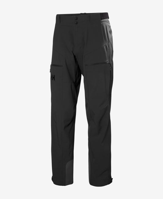 Image of a model wearing Pants. Product name - ODIN HUGINN SOFTSHELL PANT, Black in Black colour by brand - Helly Hansen