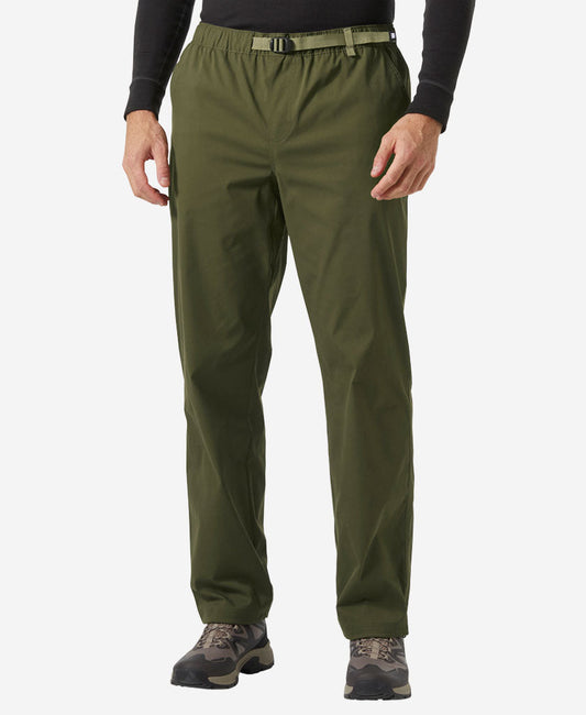Image of a model wearing Pants. Product name - HOLMEN RELAXED PANT, Utility Green in Utility Green colour by brand - Helly Hansen