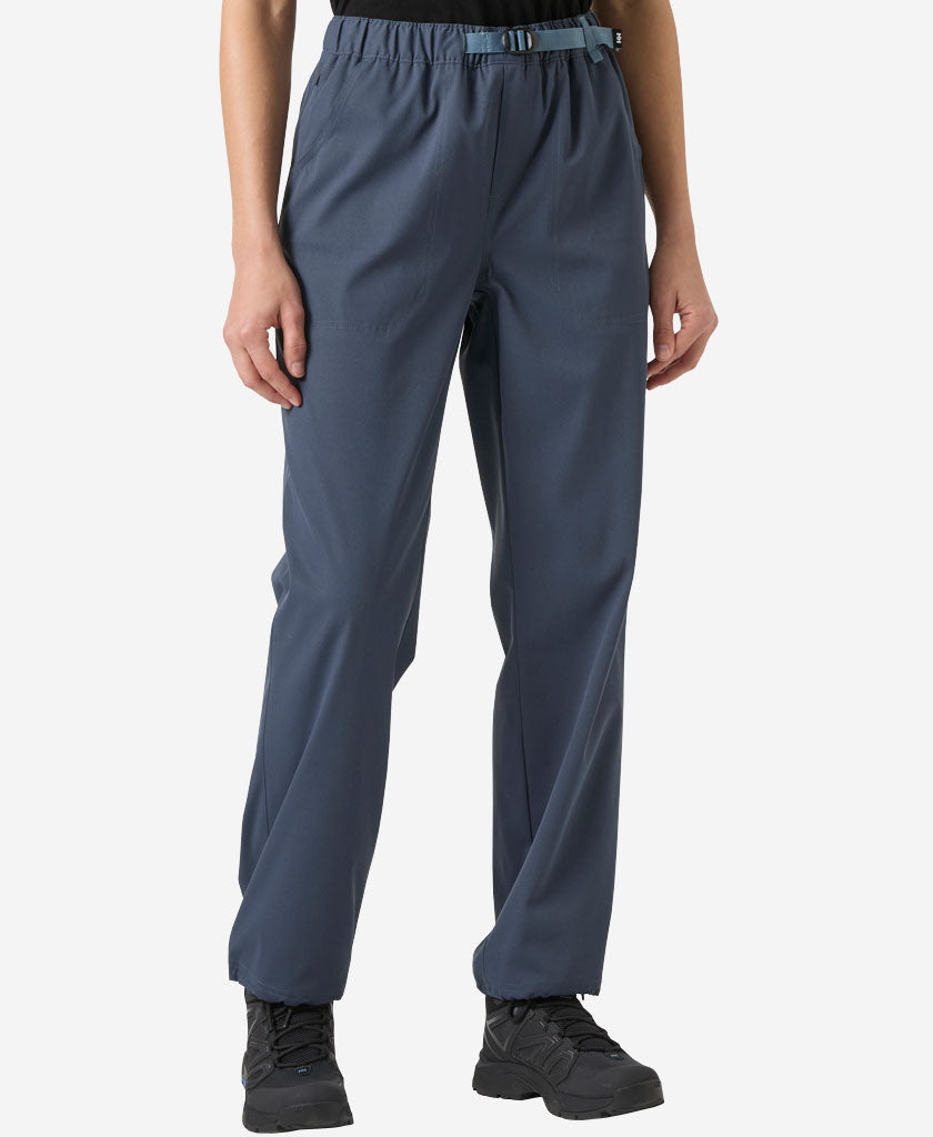 Image of a model wearing Pants. Product name - W HOLMEN RELAXED PANT, Alpine Frost in Alpine Frost colour by brand - Helly Hansen