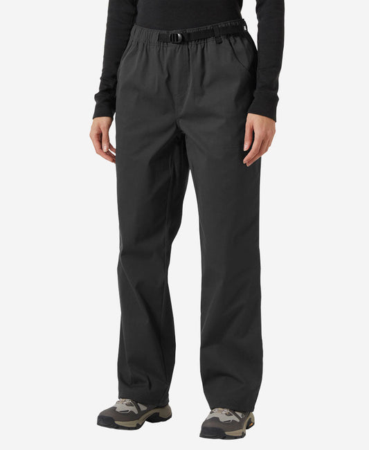 Image of a model wearing Pants. Product name - W HOLMEN RELAXED PANT, Ebony in Ebony colour by brand - Helly Hansen