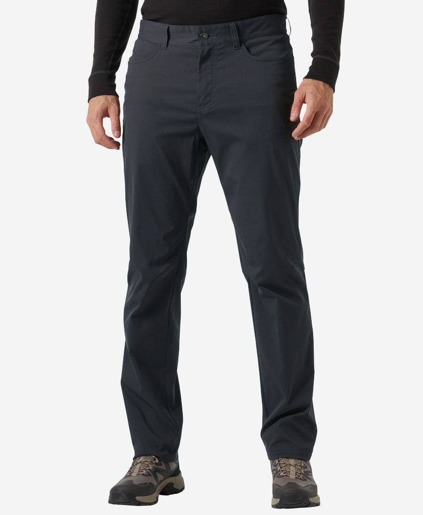 Image of a model wearing Pants. Product name - HOLMEN 5 POCKET PANT, Ebony in Ebony colour by brand - Helly Hansen