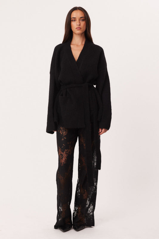 Image of a model wearing Pants. Productname: SNDYS NYSSA LACE PANTS in Black colour by brand - SNDYS