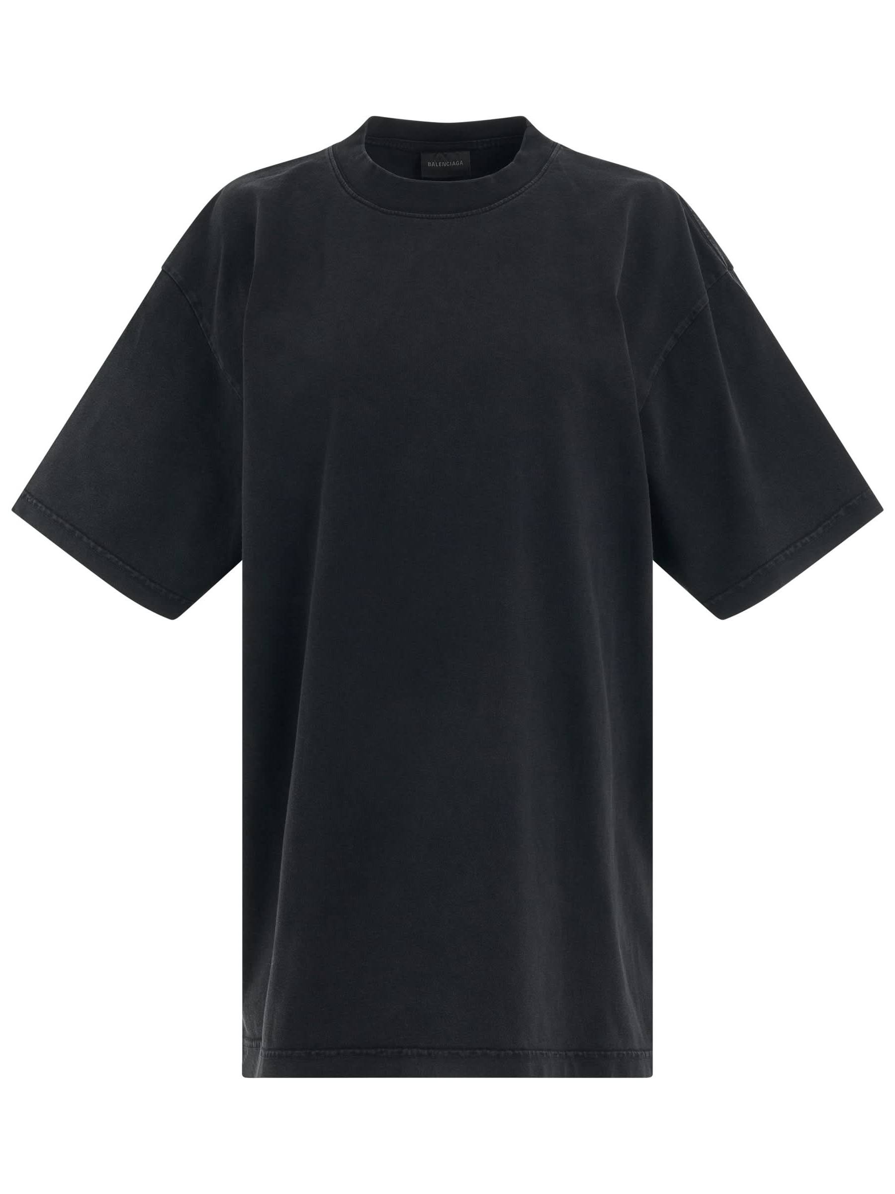 Image of a model wearing Tops. Productname: BALENCIAGA Back logo Rhinestones Oversized T-Shirt in BLACK colour by brand - BALENCIAGA