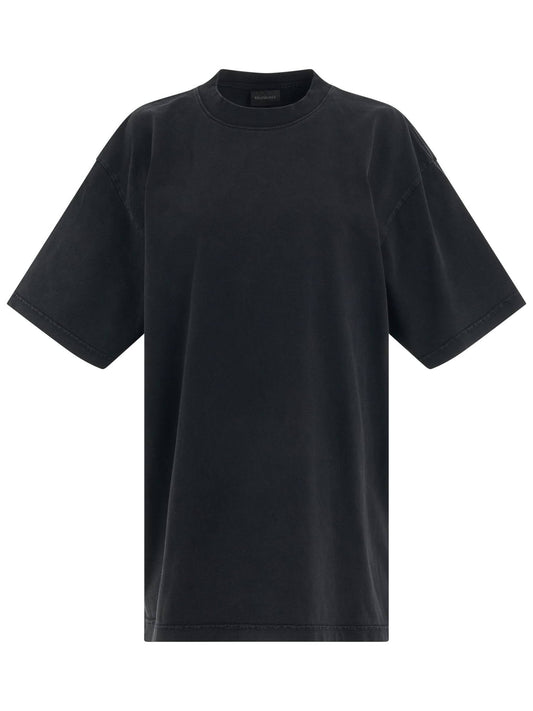 Image of a model wearing Tops. Productname: BALENCIAGA Back logo Rhinestones Oversized T-Shirt in BLACK colour by brand - BALENCIAGA