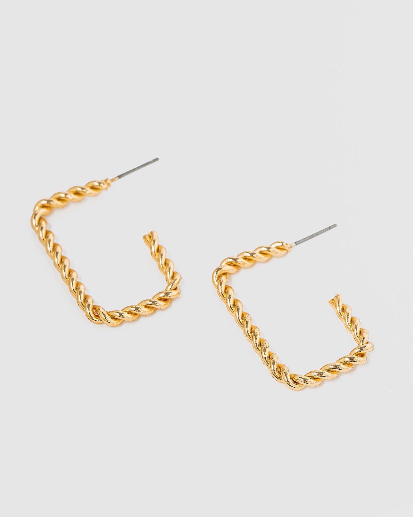 Image of Earrings. Productname: Colette Gold Open Twisted Regtangle Hoop Earrings in Gold colour by brand - Colette