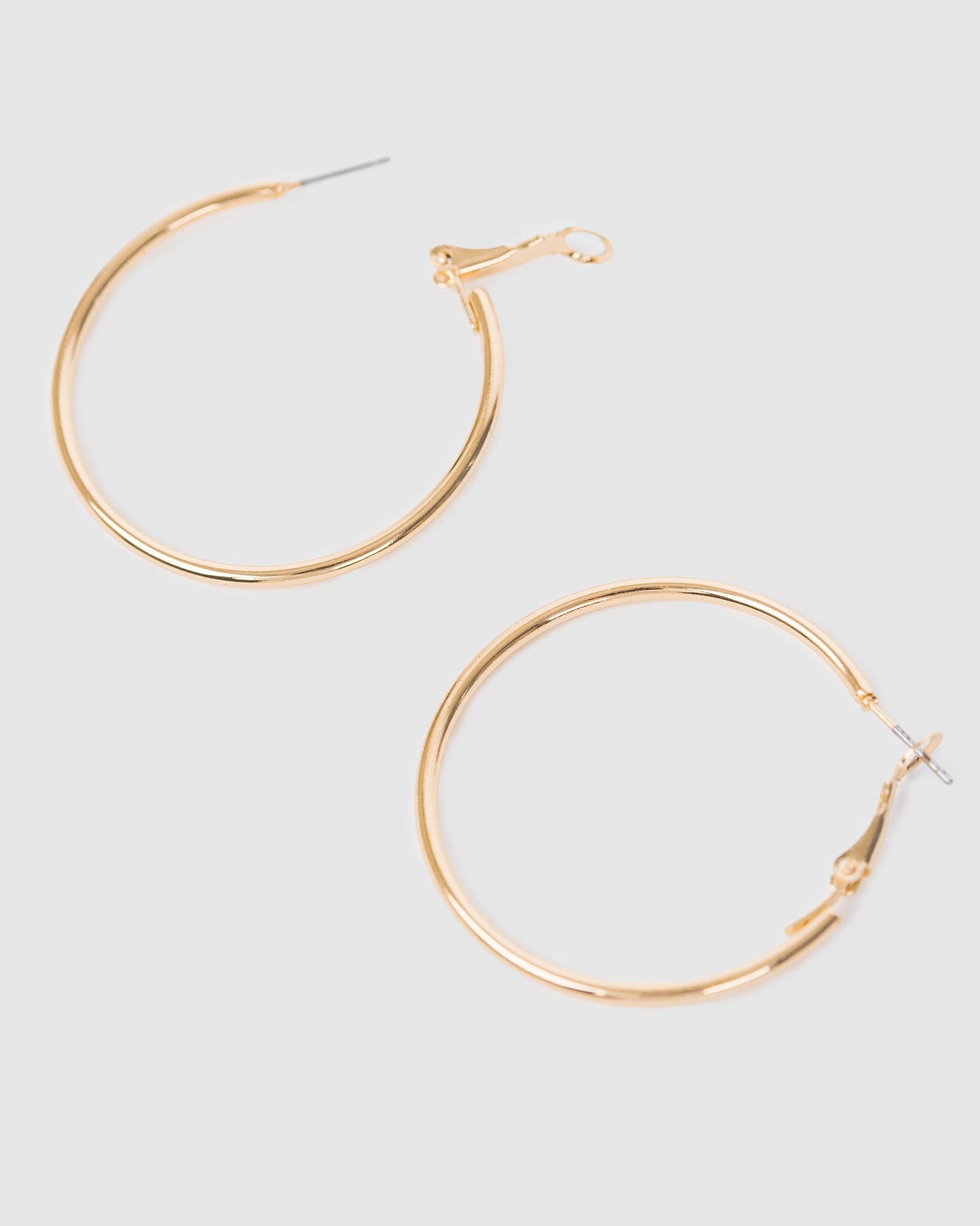 Image of Earrings. Productname: Colette Gold Fine Hoop Earrings 40mm in Gold colour by brand - Colette