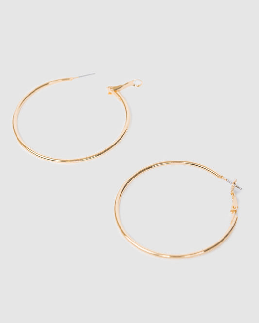 Image of Earrings. Productname: Colette Gold Fine Hoop Earrings 50mm in Gold colour by brand - Colette