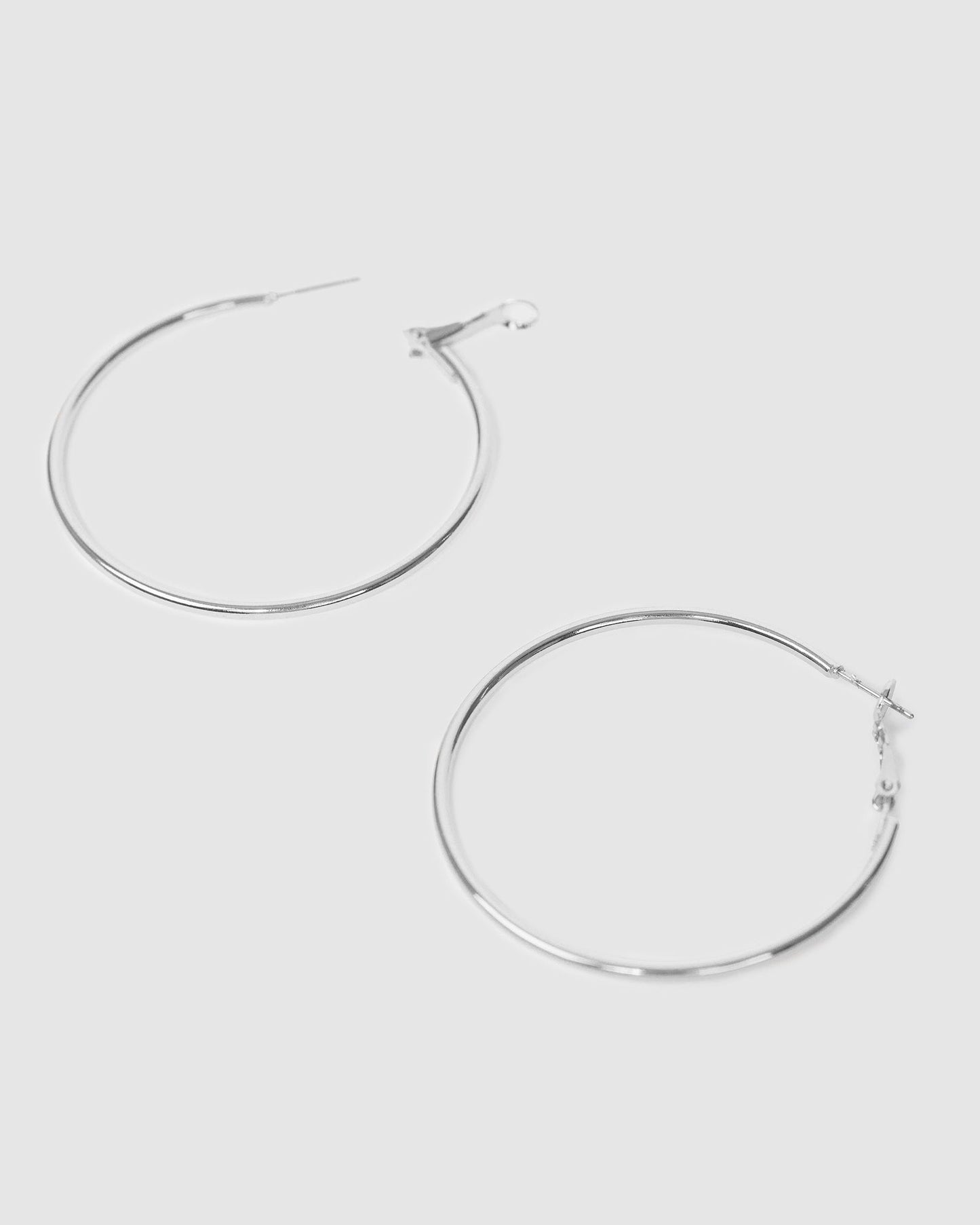 Image of Earrings. Productname: Colette Silver Fine Hoop Earrings 50mm in Silver colour by brand - Colette
