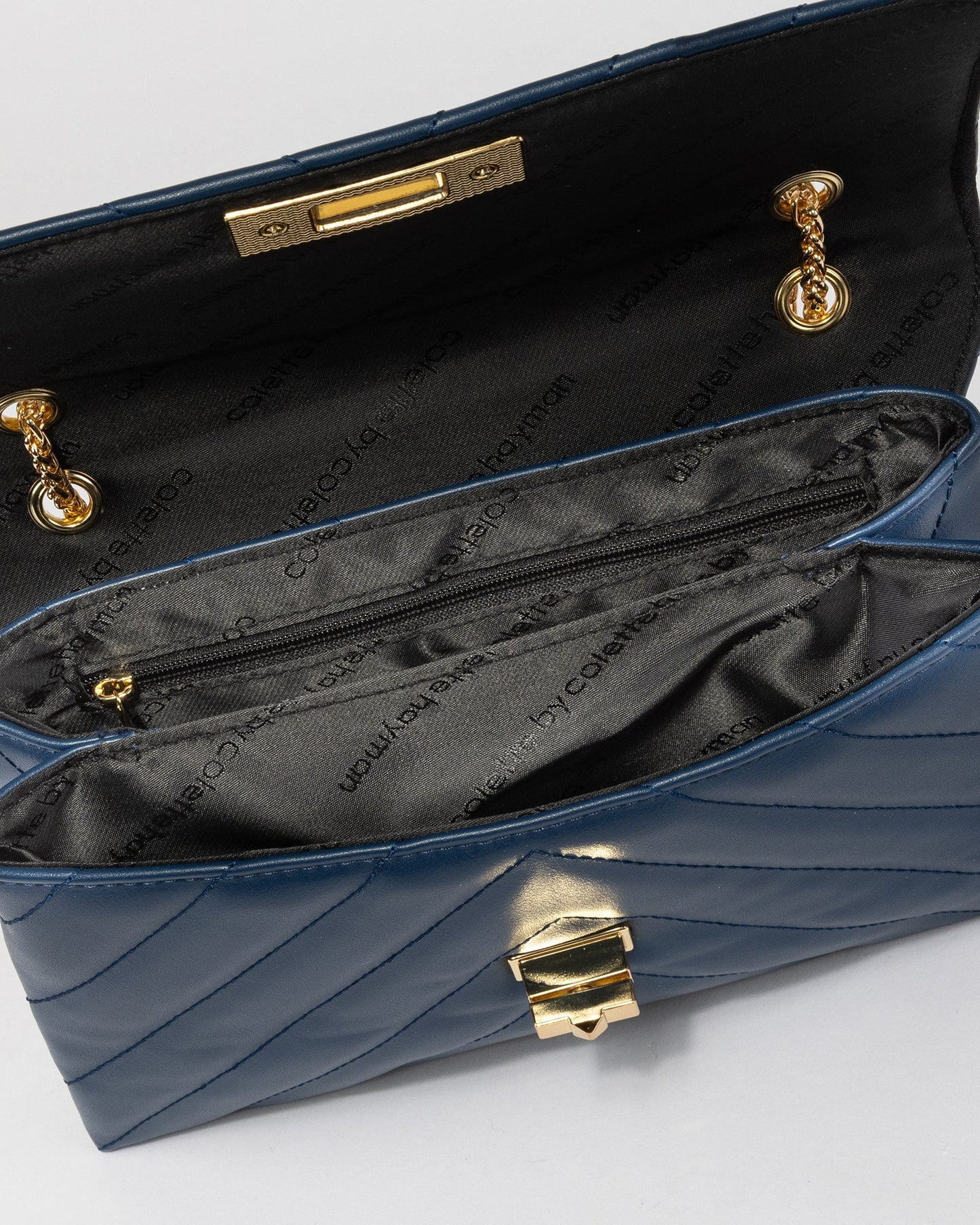 Colette by Colette Hayman Zion Arrow Crossbody (Blue)