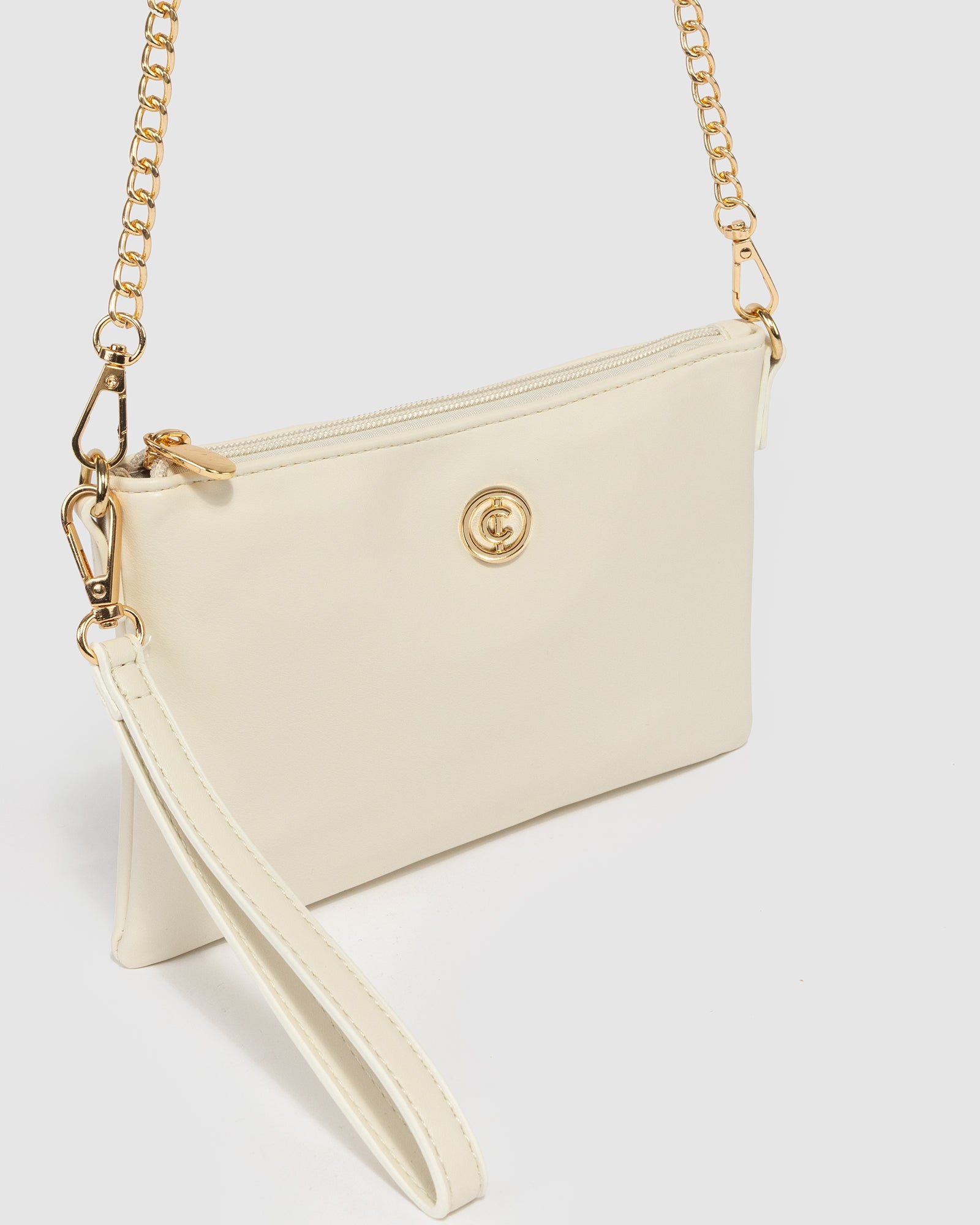 Image of Bags. Productname: Ivory Peta Chain Crossbody in Ivory colour by brand - Colette by Colette Hayman