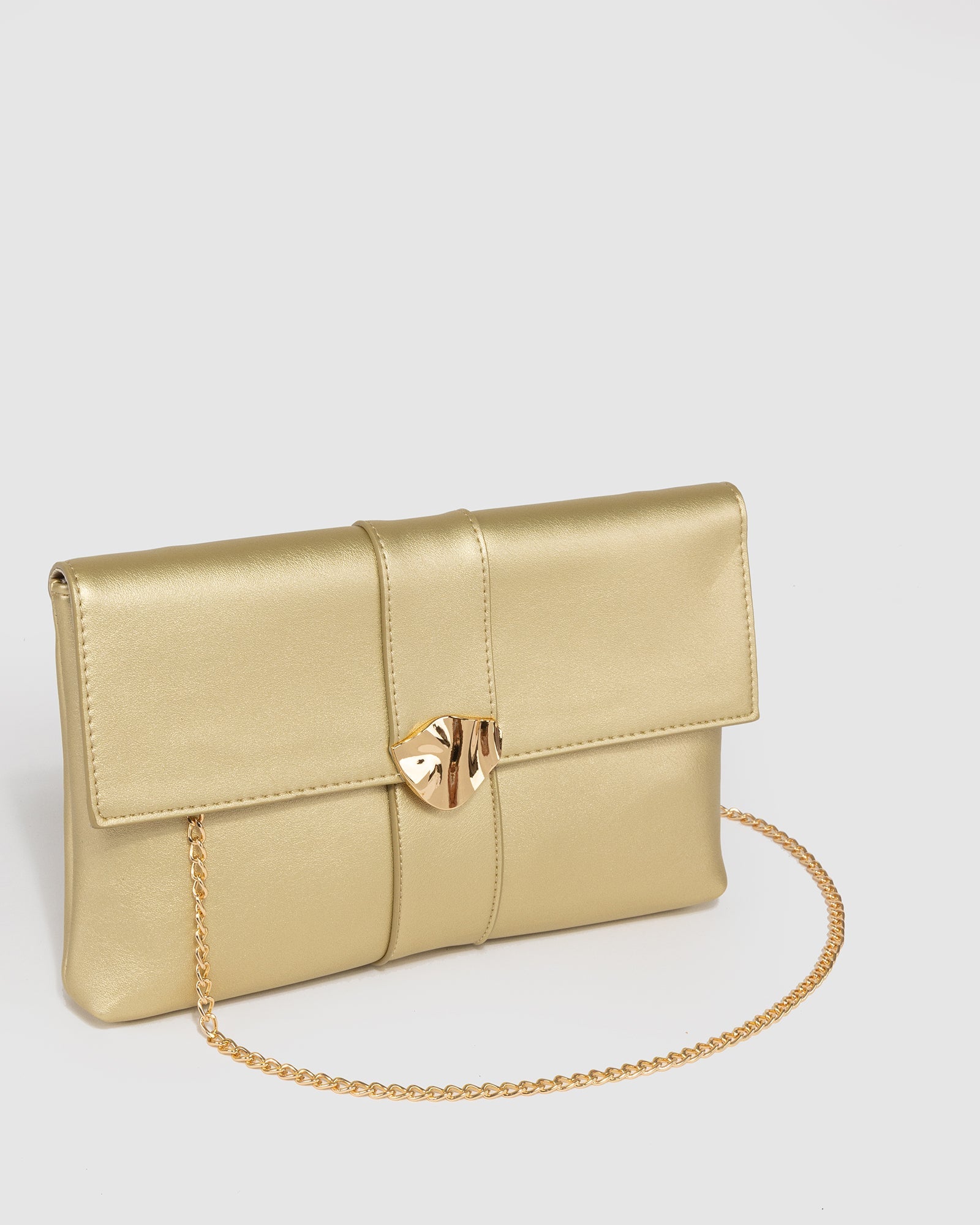 Image of Clutch Bags. Productname: Gold Polly Flap Clutch in Gold colour by brand - Colette