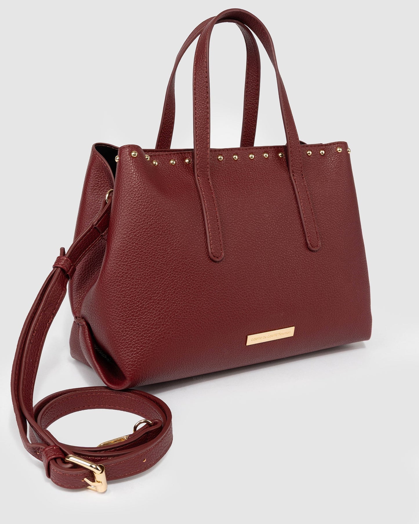 Image of Tote Bags. Product name - Berry Tamia Studded Tote in Berry colour by brand - Colette by Colette Hayman