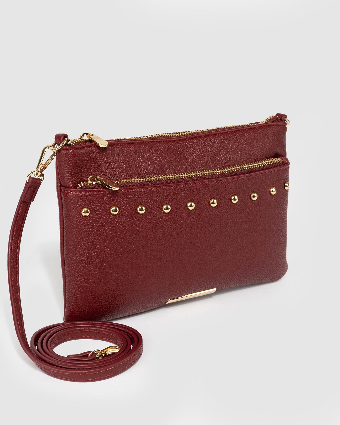 Image of Bags. Product name - Berry Demi Studded Crossbody in Berry colour by brand - Colette by Colette Hayman