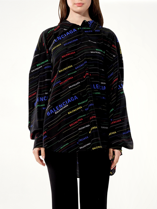 Image of a model wearing Tops. Productname: BALENCIAGA New Bow Blouse in BLACK colour by brand - BALENCIAGA