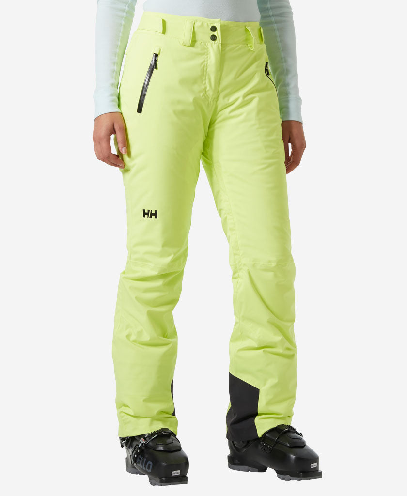 Image of a model wearing Pants. Product name - W LEGENDARY INSULATED PANT, Sunny Lime in Sunny Lime colour by brand - Helly Hansen