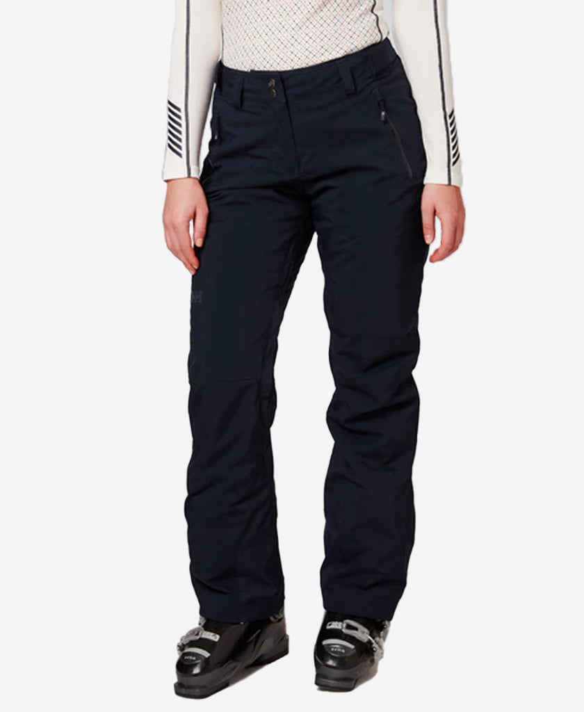 Image of a model wearing Pants. Product name - W LEGENDARY INSULATED PANT, Navy in Navy colour by brand - Helly Hansen