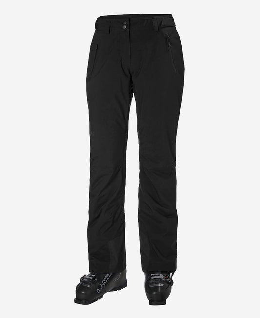Image of a model wearing Pants. Product name - W LEGENDARY INSULATED PANT, Black in Black colour by brand - Helly Hansen
