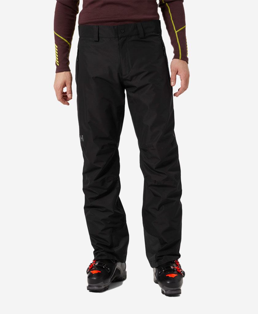 Image of a model wearing Pants. Product name - BLIZZARD INSULATED PANT, Black in Black colour by brand - Helly Hansen