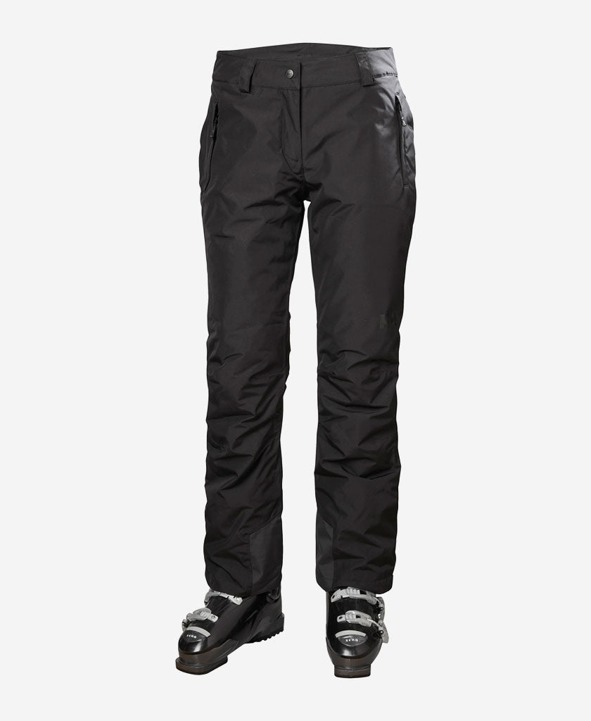 Image of a model wearing Pants. Product name - W BLIZZARD INSULATED PANT, Black in Black colour by brand - Helly Hansen