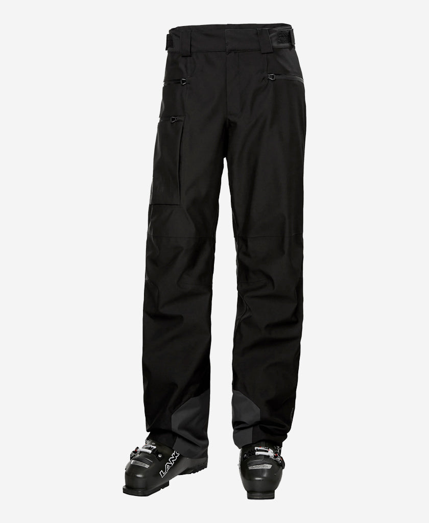 Image of a model wearing Pants. Product name - GARIBALDI 2.0 PANT, Black in Black colour by brand - Helly Hansen