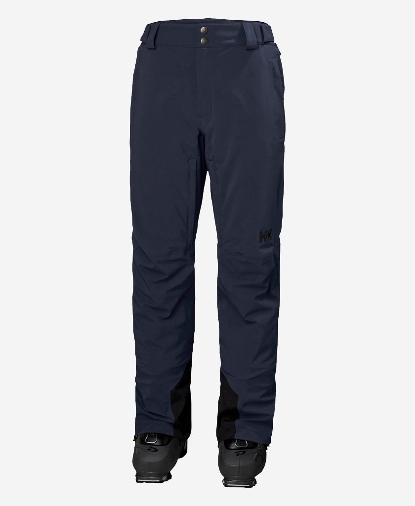 Image of a model wearing Pants. Product name - RAPID PANT, Navy in Navy colour by brand - Helly Hansen