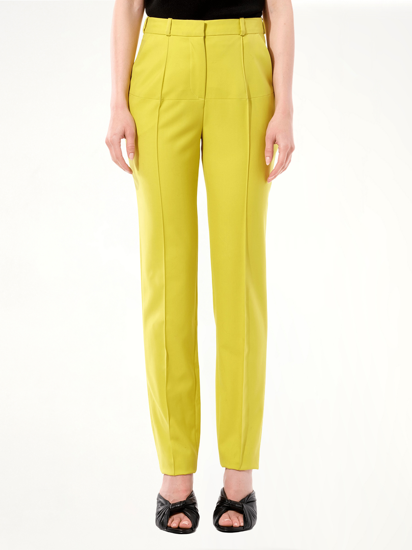 Image of a model wearing Pants. Product name - Casual Pants in Black colour by brand - BALENCIAGA