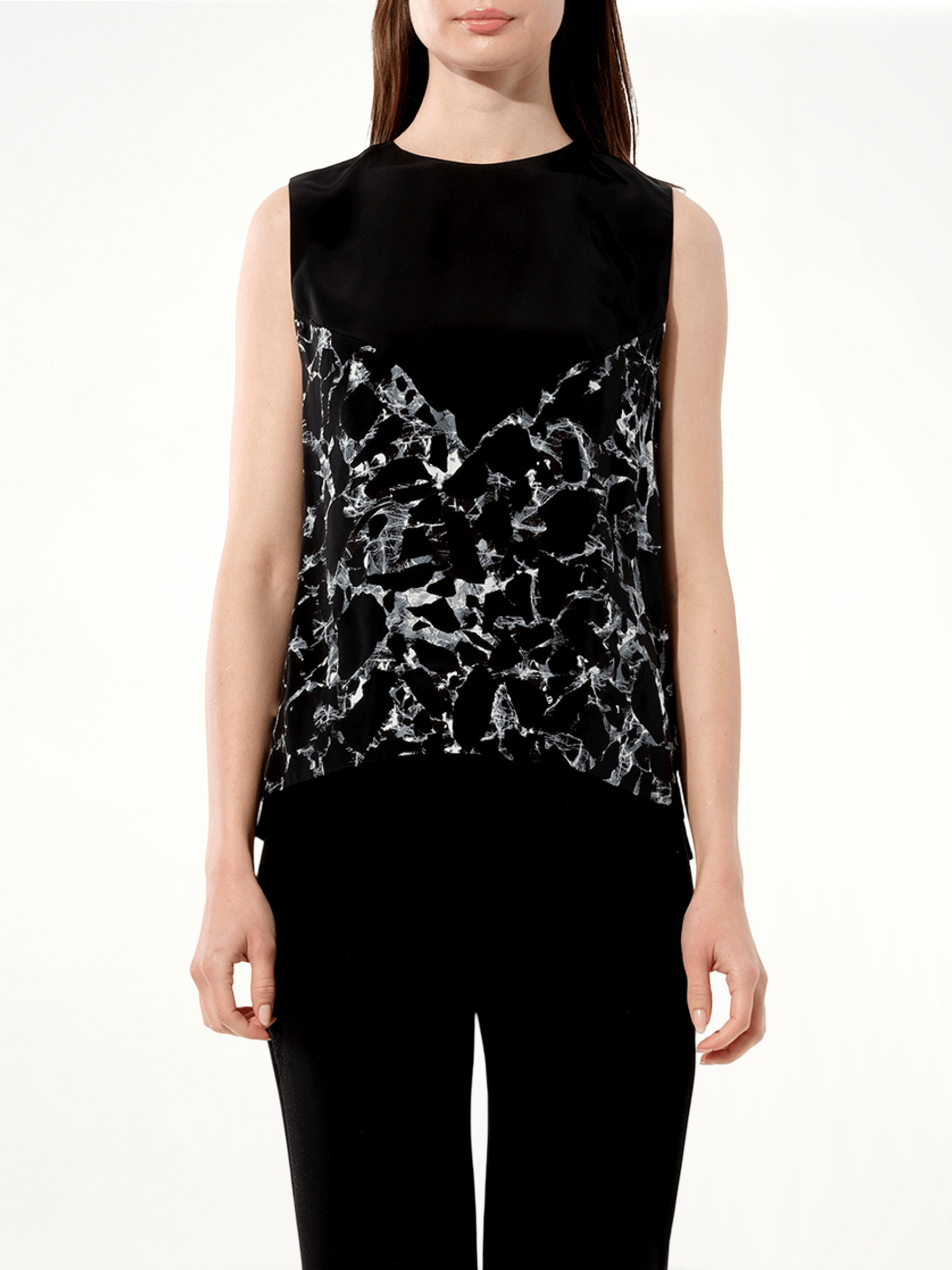 Image of a model wearing Tops. Product name - Top in Black colour by brand - BALENCIAGA