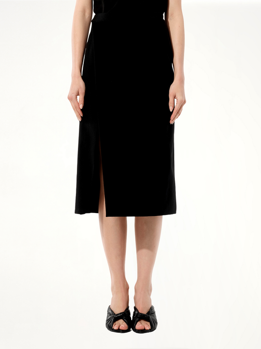 Image of a model wearing Skirts. Product name - Skirt in Black colour by brand - BALENCIAGA