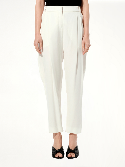 Image of a model wearing Pants. Productname: BALENCIAGA Pants in WHITE colour by brand - BALENCIAGA