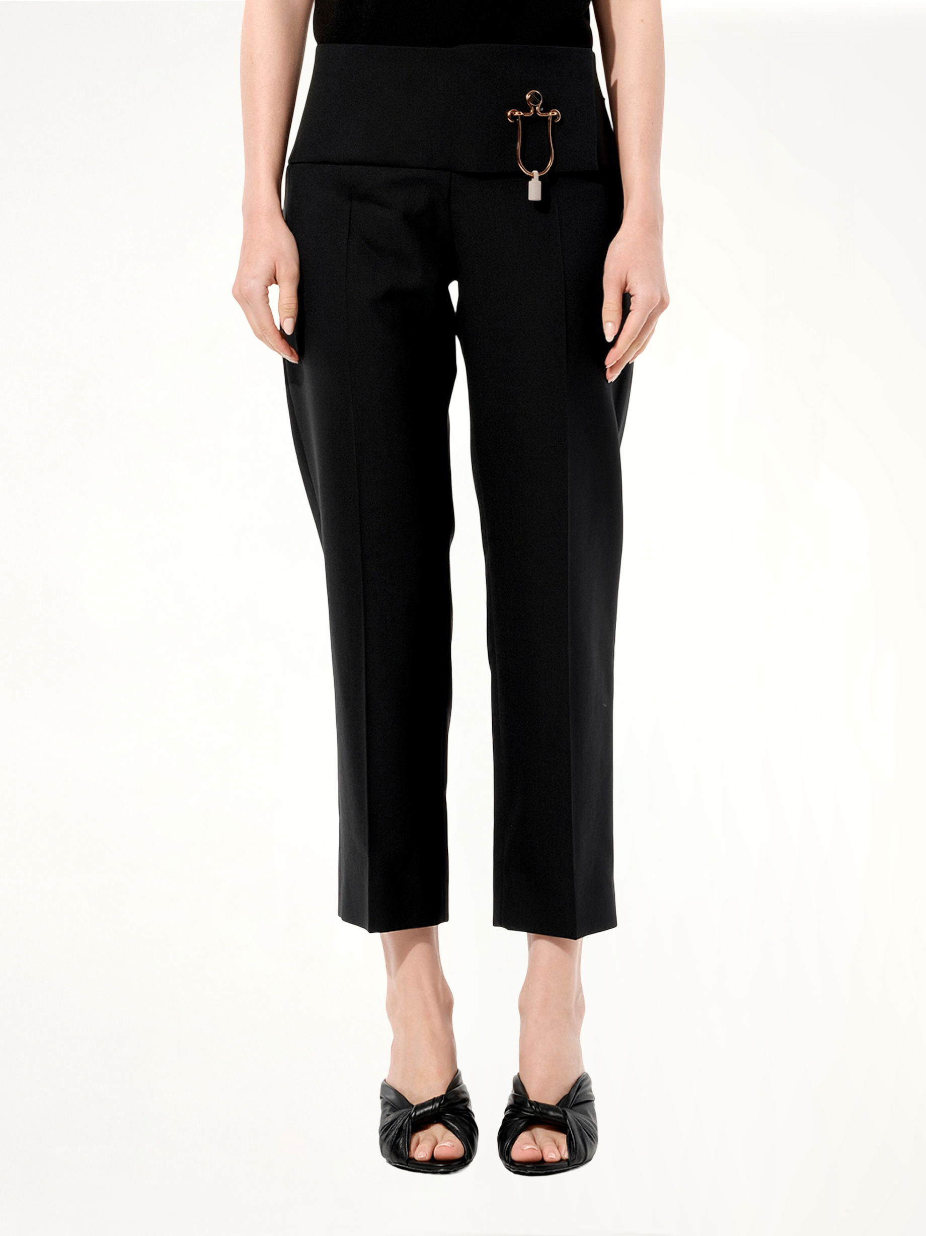 Image of a model wearing Pants. Productname: BALENCIAGA Bachette Pants in BLACK colour by brand - BALENCIAGA