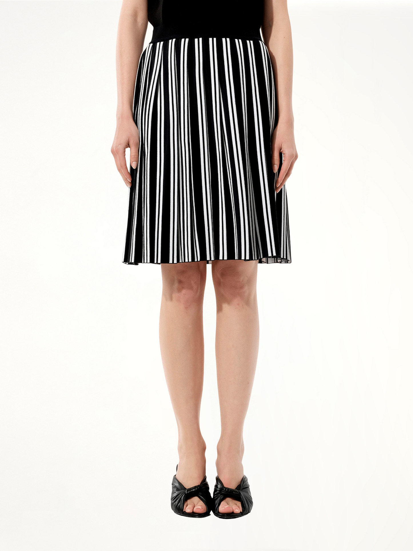 Image of a model wearing Skirts. Productname: BALENCIAGA Graph Skirt in BLACK colour by brand - BALENCIAGA