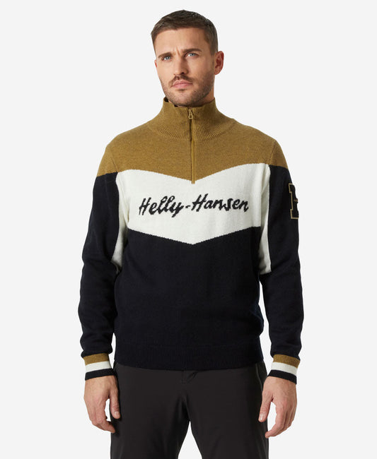 Image of a model wearing Outerwear. Product name - APRES KNITTED SWEATER, Black in Black colour by brand - Helly Hansen
