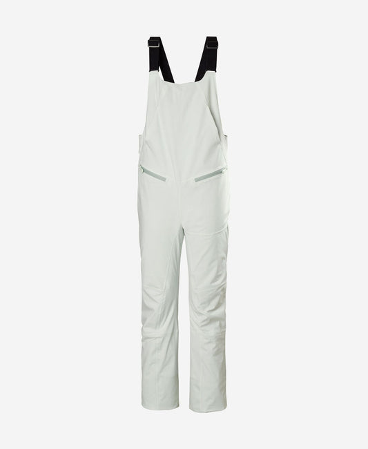 Image of a model wearing Pants. Product name - W ALPHELIA BIB PANT, Seafoam in Seafoam colour by brand - Helly Hansen