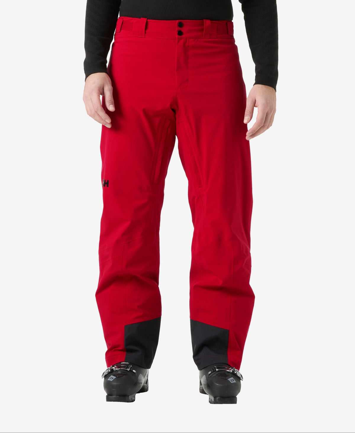 Image of a model wearing Pants. Product name - ALPHA INS PANT, Red in Red colour by brand - Helly Hansen