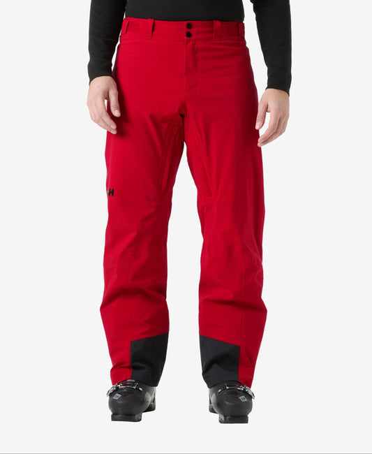 Image of a model wearing Pants. Product name - ALPHA INS PANT, Red in Red colour by brand - Helly Hansen