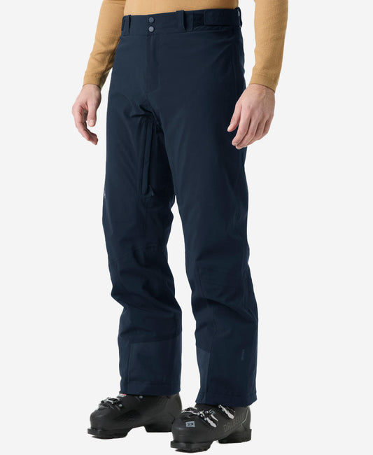 Image of a model wearing Pants. Product name - ALPHA INS PANT, Solid Navy in Solid Navy colour by brand - Helly Hansen