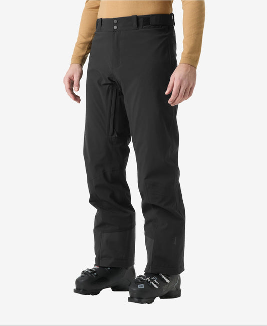 Image of a model wearing Pants. Product name - ALPHA INS PANT, Black in Black colour by brand - Helly Hansen