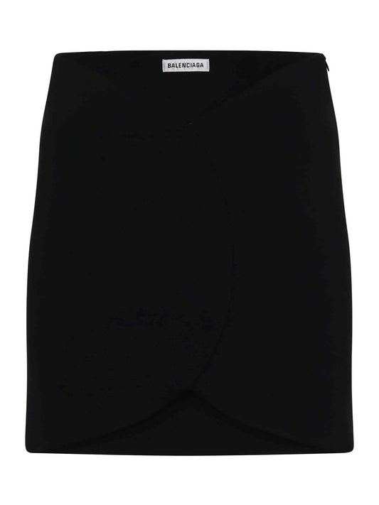 Image of a model wearing Skirts. Productname: BALENCIAGA Circle Mini Skirt in Black colour by brand - BALENCIAGA